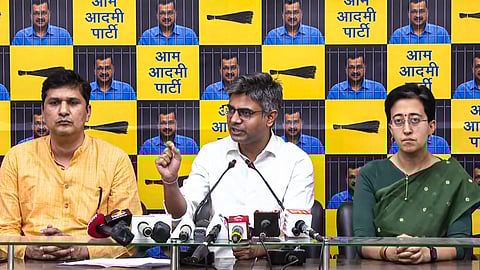 AAP leaders Sandeep Pathak, Atishi and Saurabh Bharadwaj address a press conference, a day after results for the Lok Sabha elections were declared, in New Delhi.