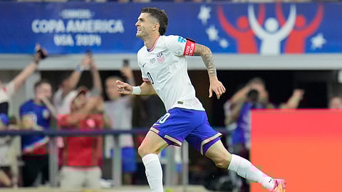 Christian Pulisic of the United States celebrates after scoring.