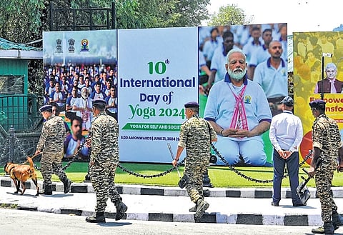 Security personnel near the SKICC on the eve of the International Day of Yoga, in Srinagar, Thursday, June 20, 2024.