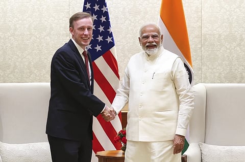 Indian Prime Minister Narendra Modi, right, shakes hands with US National Security Adviser Jake Sullivan during a meeting in New Delhi in June.