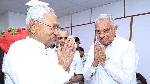 JD(U) MP Devesh Chandra Thakur (R) with Bihar Chief Minister and party president Nitish Kumar.