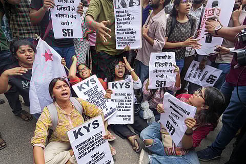 Students stage a protest over the NEET-UG and UGC-NET examinations issue, in New Delhi, Thursday, June 20, 2024.