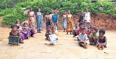 Tangellabanda tribals staged a protest after pupils were forced to wait for two hours to cross a swollen stream to reach home from school.