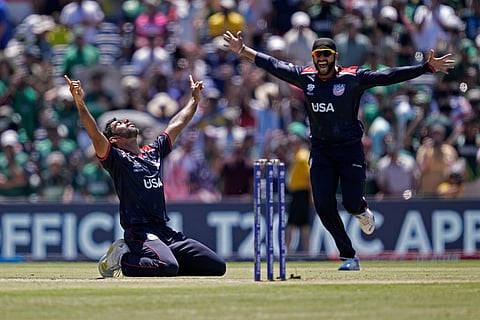 United States' Saurabh Nethralvakar, left, celebrates after their win in the ICC Men's T20 World Cup cricket match against Pakistan on June 6, 2024.