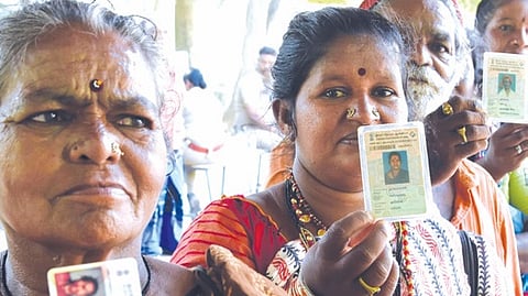 Voters of Nari Kuravar community casts their vote for the Lok sabha election at a school in Pallavaram cantonment on Friday.