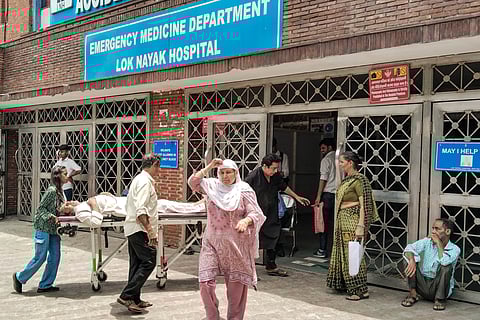 Patients being admitted due to heat stroke and exhaustion at LNJP hospital, in New Delhi, Wednesday, June 19, 2024. Due to prevailing heatwave conditions, hospitals in Delhi-NCR are seeing an influx of patients with complaints of heat stroke and exhaustion.
