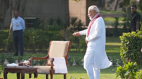 Prime Minister-designate Narendra Modi arrives to sign the visitor's book after paying tribute to former prime minister Atal Bihari Vajpayee at his memorial Sadaiv Atal, ahead of his swearing-in ceremony as the prime minister for the third consecutive term, in New Delhi, Sunday, June 9, 2024.