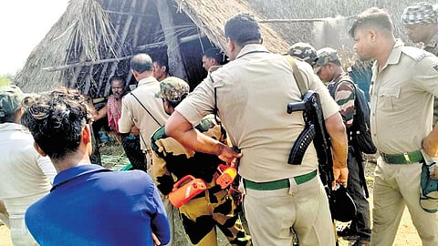 Police and forest personnel at a spot allegedly encroached upon by shrimp mafia.