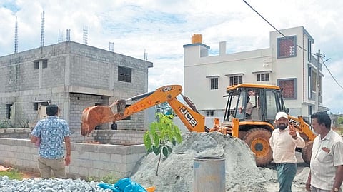Structures at an illegal layout in JB Kaval, which falls under Dr Shivarama Karanth Layout in north Bengaluru, were demolished by the BDA on Friday