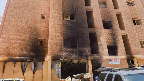 The burnt building where a fire broke out killing at least 49 people, in Mangaf, Kuwait, Wednesday, June 12, 2024.