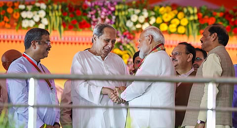 Prime Minister Narendra Modi and former Odisha chief minister Naveen Patnaik during the swearing-in ceremony of the new Odisha government in Bhubaneswar (Photo | PTI)