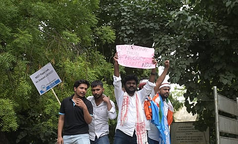 NSUI workers protesting against NEET Exam Scam at Jantar Mantar in New Delhi on Monday.