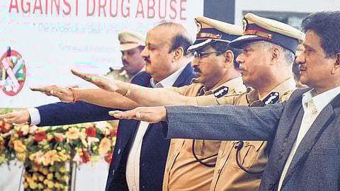 DGP Ch Dwaraka Tirumalarao, CP PHD Ramakrishna and others taking pledge to mark International Day Against Drug Abuse.