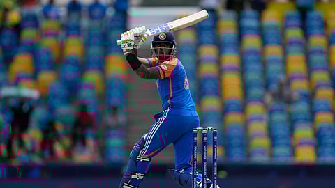 India's Suryakumar Yadav watches the ball after playing a shot during the ICC Men's T20 World Cup cricket match between Afghanistan and India at Kensington Oval in Bridgetown, Barbados, Thursday, June 20, 2024.