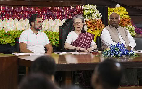 Congress President Mallikarjun Kharge with Congress Parliamentary Party Chairperson Sonia Gandhi and party leader Rahul Gandhi.