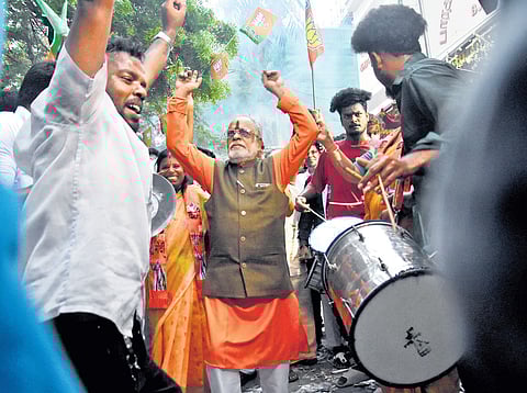 BJP cadre in Chennai celebrate even as the party-led NDA faced defeat in all the seats in Tamil Nadu