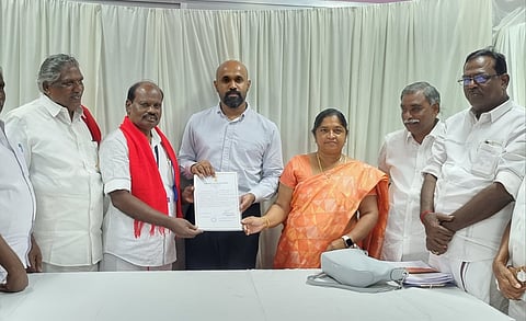 N Selvaraj receiving the winning certificate from Returning Officer Johny Tom Varghese