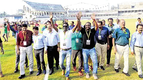Former India international footballers, including I M Vijayan, T K Chathunni, U Sharaf Ali, C C Jacob, M M Jacob, K T Chacko, N P Pradeep, K P Sethumadhavan and M A Abdul Hakkim take a stroll at the EMS Corporation Stadium in Kozhikode.