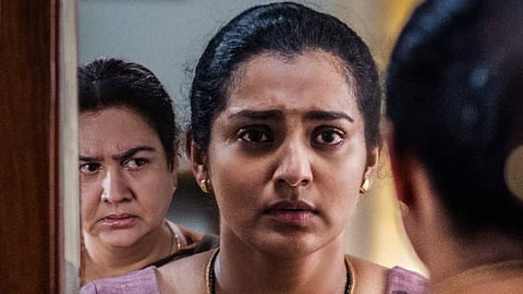 YouTube screengrab from the teaser of 'Ullozhukku' starring Parvathy and Urvashi