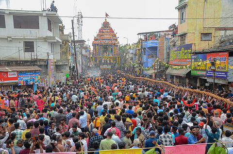The gigantic Nellaiappar temple car traverses amid a sea of devotees at Tirunelveli.