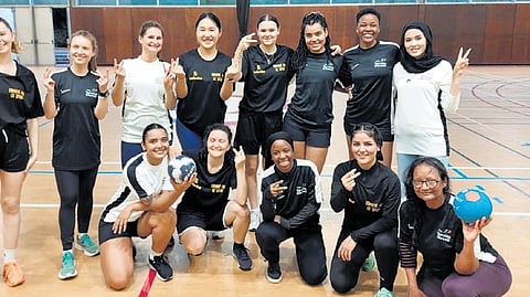 Cyclist Masomah Ali Zada along with refugee athletes, at the Terrains d’Avenir programme in Paris.