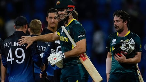 Australian cricketers Mitchell Marsh and Travis head after winning the match with Namibia