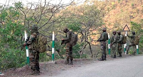 Security personnel during a search operation after a bus carrying pilgrims was ambushed by terrorists, in Reasi district of Jammu and Kashmir, Monday, June 10, 2024.