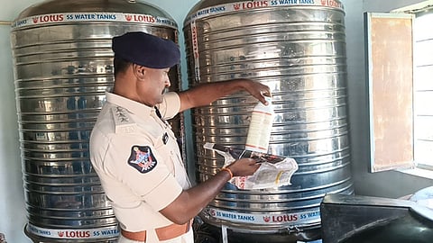 Some unidentified person threw a pesticide bottle in one of the water tanks in Tumbiganuru village, Kannekallu mandal of Anantapur district.