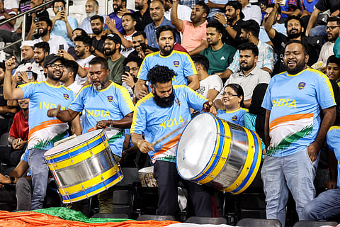 Indian supporters cheer for their team before the FIFA World Cup AFC qualifier between Qatar and India at the Jassim Bin Hamad Stadium in Doha (Photo | AFP)