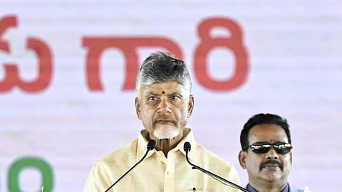TDP supremo N Chandrababu Naidu swears as the chief minister of AP at Kesarapalli on Wednesday. Express