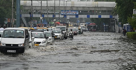 Water logging due to heavy rain at ITO In New Delhi on Friday.