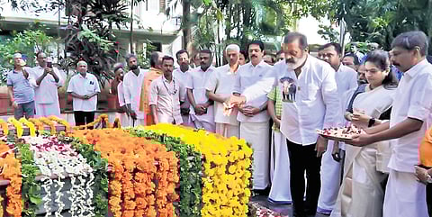 Union Minister Suresh Gopi offers floral tributes at the tomb of K Karunakaran and Kalyanikutty Amma at Punkunnam in Thrissur on Saturday