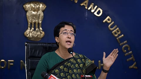 Delhi Minister Atishi addresses a press conference on water issue in New Delhi.