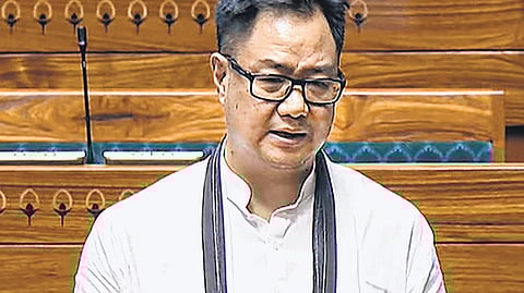 Union minister Kiren Rijiju speaks in the Lok Sabha on Thursday.