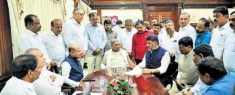 Deputy Chief Minister DK Shivakumar and Ramanagara district Congress leaders hand over a proposal to Chief Minister Siddaramaiah, requesting renaming the district as Bengaluru South, in Vidhana Soudha on Tuesday