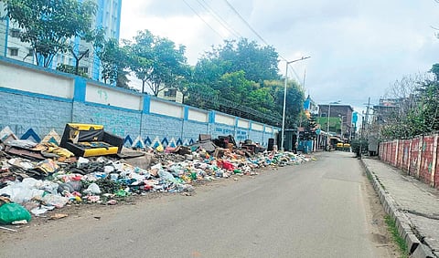 The garbage piled up on the side of the LB Shastri Road as the door-to-door collection was hit due to the protest by Mittiganahalli residents.