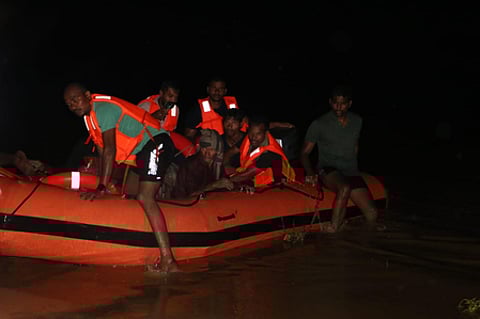 Trapped victims are seen being rescued at Pedavagu project in Aswaraopet Manda