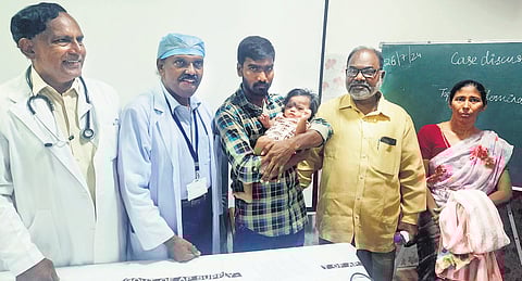 GGH doctors along with the infant who was successfully treated