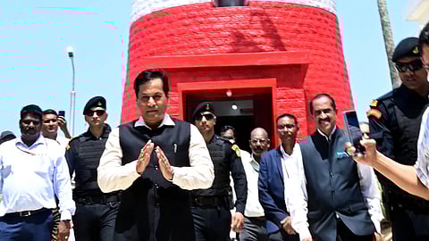 Union Minister of Ports, Shipping and Waterways Sarbananda Sonowal returns after visiting the lighthouse on the Kovalam Beach in Thiruvananthapuram on Thursday.