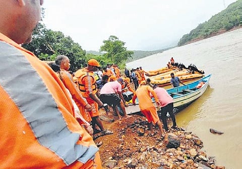 A team conducts the search for truck driver Arjun in the Gangavalli river.