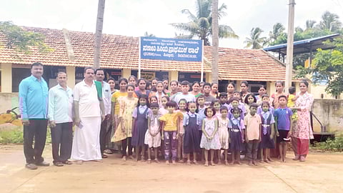 Parents, SDMC members and students in front of Government Higher Primary School in Hitturu