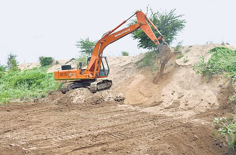 Sand being supplied under free sand policy at Tallayapalem