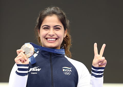 Bronze medalist Manu Bhaker of India poses during the medal ceremony for the 10m Air Pistol Women event of the Shooting competitions in the Paris 2024 Olympic Games at the Shooting centre in Chateauroux, France