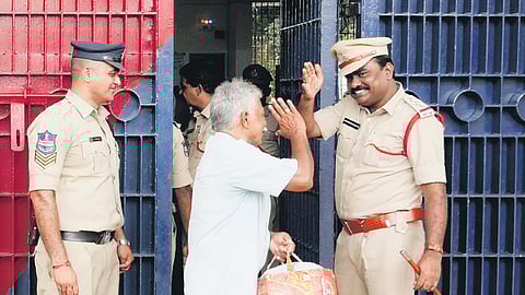 D Rajam, a prisoner, salutes a police officer after walking out of Central Prison on remission in Cherlapally on Wednesday