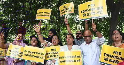 AAP workers protest outside LG Secretariat, demanding action against MCD Commissioner and officers over the Old Rajinder Nagar incident in New Delhi on Monday.