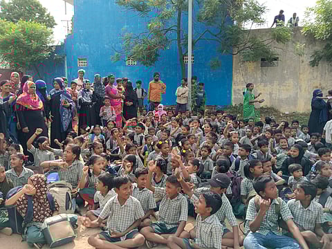 Vellore Corporation Primary School children staging protest in Chinna Allapuram in Vellore on Tuesday