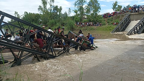 Locals managed to rescue three persons who were travelling in the truck but the driver, identified as Md Borajao (45), went missing