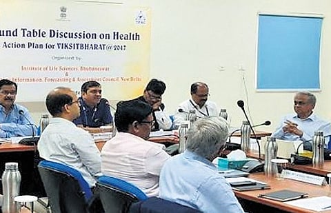 Scientists, and healthcare experts engrossed in discussion during the national round table at ILS, Bhubaneswar