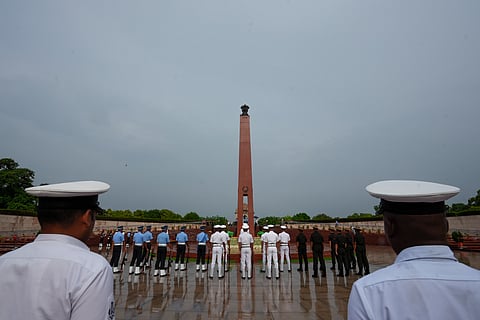 Defence personnel pay tribute to the Kargil War martyrs at the National War Memorial on the 25th anniversary of the Kargil Vijay Diwas.