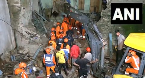 NDRF team engange in rescue operations after a house collapsed in Khambhalia taluka of Dwarka district on Tuesday.